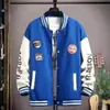 Chaqueta de Béisbol Patchwork Retro Americano con Bloques de Color y Estampado de Insignia, Corte Holgado, Chaqueta Versátil para Pareja, Otoño 2026