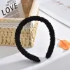 Fábrica mayorista de diademas de peluche de cordero de celebridad en línea color sólido dulce simple para lavado de cara maquillaje accesorios para el cabello de mujer color opcional