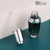 Botella Redonda de Hombro para Aceite Esencial de Cuidado de la Piel de 50ml Fondo Alto Fondo Grueso Gotero de Presión Botella de Aceite para Bebés Aceite Vegetal Botella de Aceite para el Cuidado de la Piel