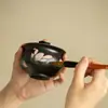 Cerámica negra, tinta plana, diseño de lirio, pintura al agua pura, tapa ribeteada en oro, cuenco de té de gran capacidad, cuenco con infusor de té, juego de té de cerámica, cuenco de té