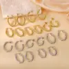 Pendientes de Otoño e Invierno 2024 Moda Elegantes Estéreo de Gama Alta Hebilla de Oreja Hilo Retorcido Anillo Liso Acero de Titanio Femenino con Estilo