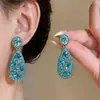 Aretes de aguja plateada con diamantes, borlas geométricas de perlas, ultra brillantes, lujosos y exquisitos, personalizados y elegantes, aretes de alta gama