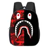 Mochila Escolar Nueva Modelo Tiburón Transfronteriza para Niños Estudiante Portátil Gran Capacidad Guardería Mochila Reductora de Carga Almacenamiento Venta al por Mayor