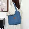 Bolsa de lona de mezclilla simple de gran capacidad, nuevo bolso de hombro casual Otoño 2026, bolso cruzado para axila para mujer