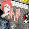 Calcetines de lunares dulces nuevos de otoño e invierno calcetines de lunares para niños estilo académico caricatura japonesa y coreana fabricantes de Liaoyuan al por mayor