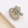 Anillo abierto de borla de bola plisada irregular europea y americana, anillo de diseño de nicho europeo y americano, venta al por mayor de joyería de alta gama