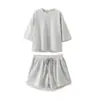 Ropa Europea y Americana Transfronteriza para Mujer AliExpress Venta Caliente Moda Terciopelo Acanalado Manga Corta + Conjunto de Shorts de Terciopelo