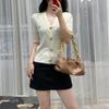 Primavera e Verão Novo Metal Button V-neck Loose Knitted Sweater Mulheres Fragrância Pequena Luz Madura Elegante Mid-sleeve Thin Cardigan Casaco Mulheres