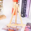 Venta directa Marco de fotos de madera maciza decorativo mini coreano Exhibidor de calendario de escritorio Estante de exhibición pequeño de madera para escritorio Caballete de madera triangular