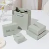 Caja de joyería de dos piezas texturizada en cuero rosa al por mayor, caja simple para anillos, caja de regalo para empaque de joyería de collares y pulseras