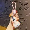 Llavero musical original de gato en PU, colgante lindo con forma de guitarra y violín, accesorio de bolso de nicho, colgante para parejas