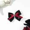 Horquilla con lazo de amor y diamantes de imitación para mujer, estilo dulce y moderno, con clip lateral distintivo, para coleta alta, elegante accesorio para el cabello.