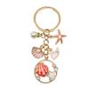 Chaveiro de concha e estrela-do-mar transfronteiriço liga pingente de gota de óleo bolsa de menina requintada chaveiro de pérola joia de presente