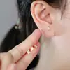 Pendientes de botón de moda creativa con 26 letras del alfabeto inglés microincrustados con circonita exquisita luz de lujo únicos pendientes Joker venta al por mayor