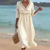 Ropa de mujer de comercio exterior europea y americana 2026, nuevo vestido de verano, estilo vacacional playero, vestido largo holgado, vestido liso de cuello en V