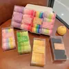 Goma para el pelo elástica al por mayor en caja para niñas coleta alta cuerda para la cabeza goma para el pelo cubierta de cuero nuevo color banda para el pelo cuerda para el pelo