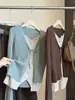 Top de Punto Elegante Estilo Francés Falso Dos Piezas con Retazos de Encaje para Mujer Otoño/Invierno 2026 Nuevo Top Camisa Base de Manga Larga con Cuello en V