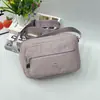 Bolso de Hombro Ligero de Múltiples Capas de Gran Capacidad 2025 Nuevo Más Fácil de Combinar Bolsa de Tela de Nylon Bolso Cruzado para Dama