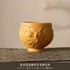 Seção Dourada Argila Roxa Bule de Chá Artesanal Relevo Minério Bruto Conjunto de Chá Kung Fu Caneca de Chá Dragão e Fênix de Alta Qualidade Bule Venda por Atacado