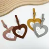 Etiqueta de equipaje con forma de corazón de cuero PU colorido en stock transfronterizo, etiqueta de equipaje simple anti-pérdida, etiqueta de facturación