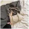 Bolsa simples com textura trançada para mulheres, nova moda de bolsa transversal verão 2026, bolsa de ombro para o dia a dia nicho e moderna
