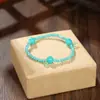 Pulsera tejida a mano de cristal con forma de hoja, pulsera vintage personalizada de nicho, joyería simple y elegante, venta al por mayor desde el fabricante