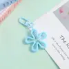 Novo Chaveiro de Flor Colorido Vazado Transparente Pingente de Joia DIY Versátil Criativo Charme para Bolsa Feminina