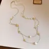 Collar redondo de perlas con cuentas estilo francés, sensación de lujo ligero y alta gama, cadena de suéter de doble capa, accesorio de nicho de diseño único para mujer