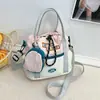 Bolso bandolera de lona nuevo estilo coreano, con un diseño fresco y moderno, perfecto para estudiantes, y un bolso de hombro lindo y versátil que se puede combinar con varios atuendos