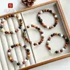 Pulsera de Madera Natural Dieciocho Semillas Hilo de Mano Hecha de Madera Original Estilo Étnico para Mujer Cuentas de Muchos Tesoros Wenwan Cuentas Budistas Cuentas de Oración Mano