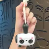 Llavero de martillo que hace ruido para aliviar el estrés de panda, colgante de martillo pequeño de silicona de capibara chillón, lindo regalito