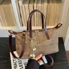 Moda Versátil de Alto Padrão Transfronteiriça Verão 2026 Novo Design de Nicho Exquisito Pequena Bolsa Quadrada de Ombro Cruzado para o Dia a Dia