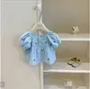 Conjunto Novo Estilo Verão para Meninas 2026 Novo Bebê Estiloso Xadrez Manga Curta Shorts Infantil Conjunto de Duas Peças Estilo Coreano Tendência