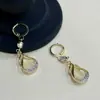 Pendientes colgantes de cristal geométrico con incrustaciones de diamantes de alta clase, pendientes de temperamento de lujo discreto para afinar el rostro, pendientes pendientes