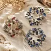 Corona de Olivo Transfronteriza Broche de Cristal Estilo Europeo y Coreano Venta al por Mayor Broche de Rama de Olivo Incrustado de Cristal Accesorios para Ropa