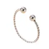 Anillos apilables de acero inoxidable transfronterizos nuevos, cuentas redondas, anillos abiertos de flor de cáñamo finos, fabricantes de joyería de mano de acero de titanio moderna y simple