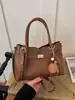 Bolso de Mano Tote de Lujo Retro para Mujer 2026 Nuevo Pequeño de Nicho para el Trabajo Casual Versátil Bolso Cruzado
