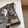 Bolsa de Mão Casual de Nicho Acessível de Luxo 2025 Nova Moda Versátil de Ombro Cruzado Bolsa Feminina Mochila Estampada de Leopardo