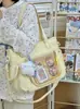 Otoño 2026 Nuevo Estilo Japonés Bolsa Ita Gran Capacidad Bolso de Hombro Cruzado Estudiante de Anime Viajero Versátil Bolso de Lona