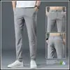 Pantalones casuales de verano para hombre, corte holgado, cintura elástica, pierna recta largos, pantalones de traje negros para primavera y otoño, estilo seda de hielo ultradelgada