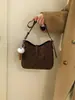 Nova Bolsa de Ombro Feminina com Estampa Floral e Bolinhas Outono/Inverno 2025, Moderna e Versátil, Casual, de Alta Qualidade, Bolsa de Luxo Leve para o Dia a Dia