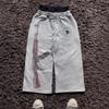 Tendencia de Moda Estadounidense 2025 Pantalones Deportivos Cruzados Europeos y Americanos de Doble Cintura Bordados Street Folding para Pareja Venta al por Mayor Bienvenido a Realizar un Pedido