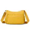 2026 Bolso Casual Impermeable de Gran Capacidad con Múltiples Bolsillos Estilo Coreano Nuevo para Mujer Bolso Versátil de Hombro Cruzado para Viajes y Compras