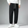 Pantalones casuales cropped para hombre para primavera y otoño, estilo grueso con cintura elástica de cordón y ligera elasticidad, estilo jogger 3W401