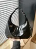 Bolso de hombro de luna tachonado con diseño de nicho estilo coreano, nuevo estilo moderno y genial 2026, bolso de mano con correa ancha para el hombro, bolso de axila