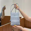 Bolso cuadrado pequeño calado estilo coreano para mujer, bolso para teléfono móvil, nuevo modelo de verano 2026, bolso de hombro/bandolera moderno y popular para el uso diario