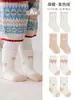 Calcetines de bebé para otoño e invierno, forrados de felpa y engrosados para abrigar, antibacterianos, sin costuras, de longitud hasta la pantorrilla, con lazo y ribete de encaje, para niñas
