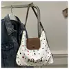 Bolsa Feminina 2024 Nova Outono e Inverno Retrô Grande Capacidade Ombro Único para o Dia a Dia Bolinhas Moda Versátil Bolsa Tote Classe Macia