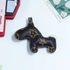 Nuevo Colgante Creativo de Cuero PU Huayang con Estampado de Mascota 3D Lindo Llavero Hecho a Mano DIY Accesorio para Bolso