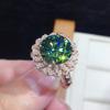 Cao Shi mano rápida tiembla transmisión en vivo nuevo anillo de circón azul verdoso imitación Maldivas con incrustaciones anillo brillante color fuego